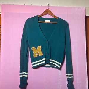 Smart green and white varsity sweater